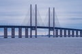 The Oresund Bridge, the bridge and underwater tunnel connecting Malmo, Sweden with Copenhagen, Denmark. Blue sky and Royalty Free Stock Photo