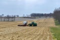 John Deere 9430 tractor pulling a KUHN 1205 Gladiator fitted with a fertilizer tank