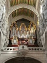 Organ and beautiful ornate ceiling in Almudena Cathedral. Madrid, Spain.