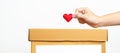 Organ Donation, Charity, Volunteer, Giving and blood Concept. Hand holding red heart into donate box for support poor, homeless, Royalty Free Stock Photo