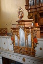 Organ inside the medieval fortified saxon church in the village Cristian, Sibiu county, Transylvania, Romania Royalty Free Stock Photo