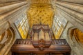 Organ and vaulted ceiling in the North Transept inside Sherborne Abbey, Dorset, UK