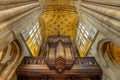 Organ and vaulted ceiling in the North Transept inside Sherborne Abbey, Dorset, UK
