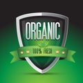 Organic 100 percent fresh on green shield Royalty Free Stock Photo