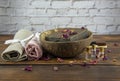 Organic aromatic handmade soap in a coconut bowl and personal care items made of natural materials .