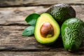 Organic avocado in a wooden table