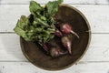 Organic beets in wooden bowl