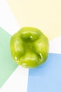 organic bell pepper or capsicum on different color background