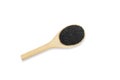 Organic Black sesame seed on wooden spoon on white background Royalty Free Stock Photo