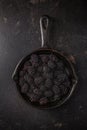 Organic blackberries in baking forms, ripe blackberries Royalty Free Stock Photo