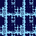 Abstract indigo blue batik dye seamless pattern, Organic bleed effect dyed wash background. Royalty Free Stock Photo