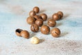 An organic blend of macadamia nuts, cashews, walnuts. Healthy product, superfood and healthy food concept.