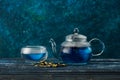 Organic blue tea Anchan, Clitoria, Butterfly Pea in a teapot and a cup Royalty Free Stock Photo