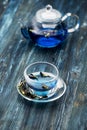 Organic blue tea Anchan, Clitoria, Butterfly Pea in a teapot and a cup Royalty Free Stock Photo