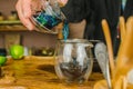 Organic blue tea Anchan in a teapot and a cups on wooden background Royalty Free Stock Photo