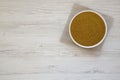 Organic Brown Sugar in a White Bowl on a white wooden background, top view. Flat lay, overhead, from above. Copy space Royalty Free Stock Photo