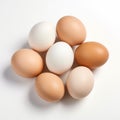 Organic Brown And White Eggs On A White Surface