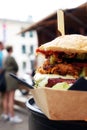 Organic Burger on street food festival. Pulled pork or burger are sold on Open kitchen food festival event. Street food Royalty Free Stock Photo