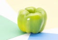 organic capsicum over on different color background
