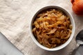 Organic Caramelized Onions in a Bowl, top view. Flat lay, overhead, from above. Copy space