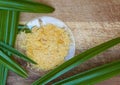 Organic Carnauba Wax comes in the form of hard yellow flakes and is widely used in cosmetics as an emulsifier or as a thickening