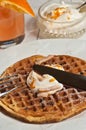 Organic carrot cake waffles with orange coconut cream