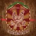 Organic chicken farm vintage label with hen with chicks on the grunge background. Royalty Free Stock Photo