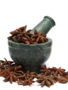 Organic Chinese Star Anise ( Illicium verum) on marble pestle