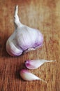 Organic clove garlic on the wooden background closeup. For this Royalty Free Stock Photo