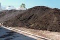 organic compost heap. fertilizer production for soil cultivation