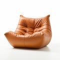 Organic Contours: Tan Leather Lounge Chair On White Floor Royalty Free Stock Photo