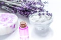 Organic cosmetic with lavender flowers and oil on white background Royalty Free Stock Photo