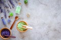 Cosmetic set with lavender herbs and sea salt in bottle on stone table background flat lay mockup Royalty Free Stock Photo