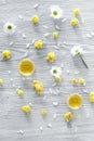 Organic cosmetics with camomile on wooden background top view Royalty Free Stock Photo