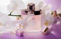 Organic cosmetics concept. Bottles of perfume with orchid Royalty Free Stock Photo