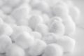 Organic cotton balls background for morning routine, spa cosmetics, hygiene and natural skincare beauty brand product as