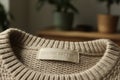 Organic cotton label on a knitted sweater Royalty Free Stock Photo