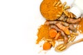 Organic curcumin or turmeric powder, capsule, and fresh root on white background Royalty Free Stock Photo