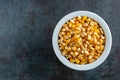 Organic Delicious Yellow Popcorn Kernels In White Bowl Royalty Free Stock Photo