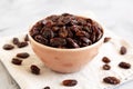 Organic Dried Chilean Dark Raisins in a Bowl, side view. Copy space Royalty Free Stock Photo