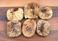 Organic Dried figs on a wooden cutting board Royalty Free Stock Photo