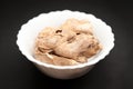 Organic Dried Ginger root in ceramic bowl Royalty Free Stock Photo
