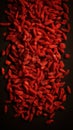 Organic Dried Goji Berry Vertical Background.