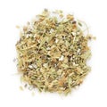 Organic dry green cardamom (Elettaria cardamomum) tea cut seeds. Royalty Free Stock Photo