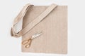 Organic eco shopping bag with tailor scissors.