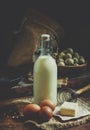 Organic farm products, ingredients for omelets or baking. Vintage wooden background, rustic style. Low key, selective focus and t