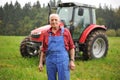 Farmer and his Red Tractor Royalty Free Stock Photo