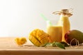 Organic farming mango juice with fruit on table isolated background Royalty Free Stock Photo