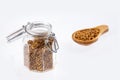 Organic fenugreek seeds in the glass jar. Trigonella foenum-graecum Royalty Free Stock Photo
