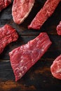 Organic Flank bavette or flap steak beef t steak near tri-tip and top blade oyster cuts close up in front of other cuts in Royalty Free Stock Photo